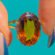 Art Deco Madeira Citrine solitaire ring, front view of the oval stone and six claws