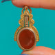 Carnelian face of the swivel watch key with the tube folded into the frame