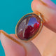 9ct Gold Bezel-Set Garnet Cabochon Charm