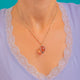 Victorian 18ct Gold & Silver "Pools of Light" Rock Crystal Pendant, worn on a chain for scale